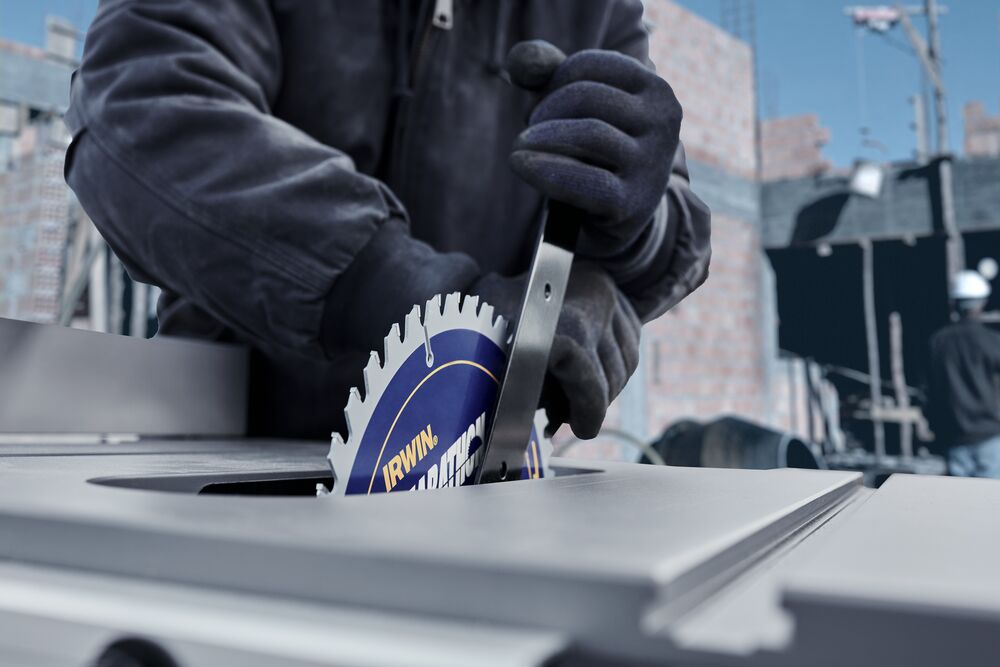 A man using a table saw with MARATHON IRWIN DISC