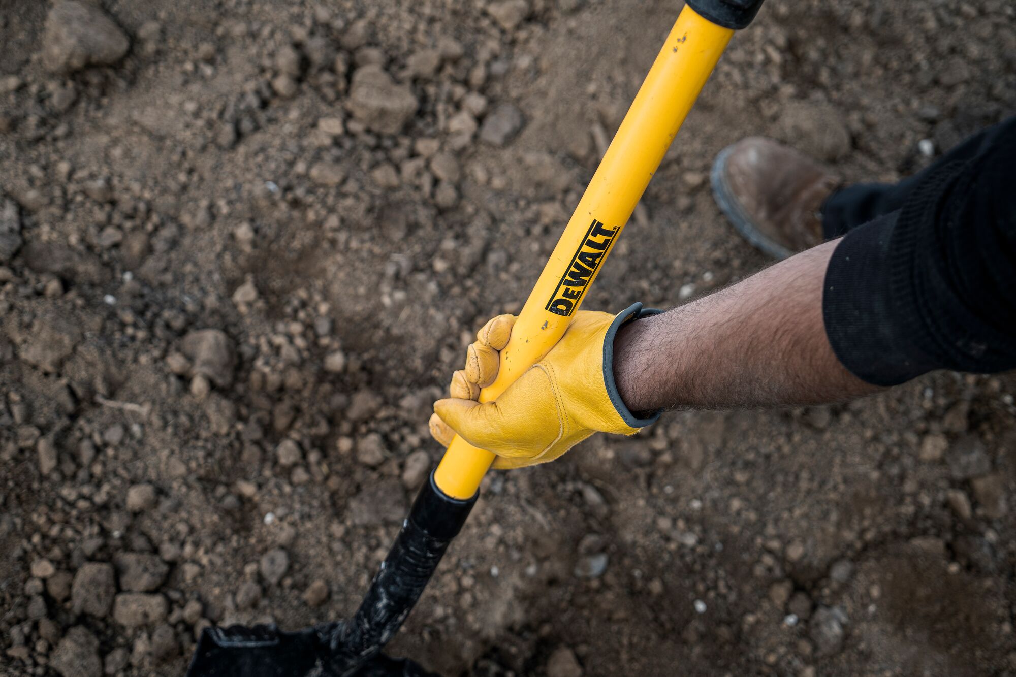 32 inch Fiberglass D-Handle Digging Shovel close up of top of handle in gloves