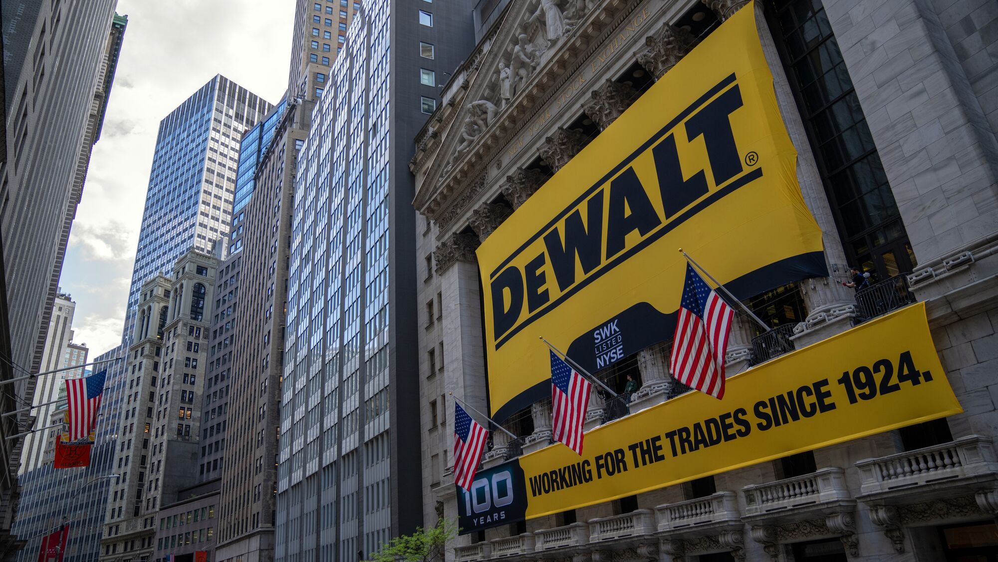 Large aerial shot of DEWALT banner hanging on the New York Stock Exhange