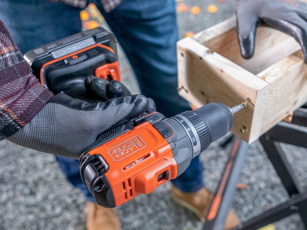 A wooden candle holder being assembled with the BLACK+DECKER POWERCONNECT  18V Cordless Drill Driver.