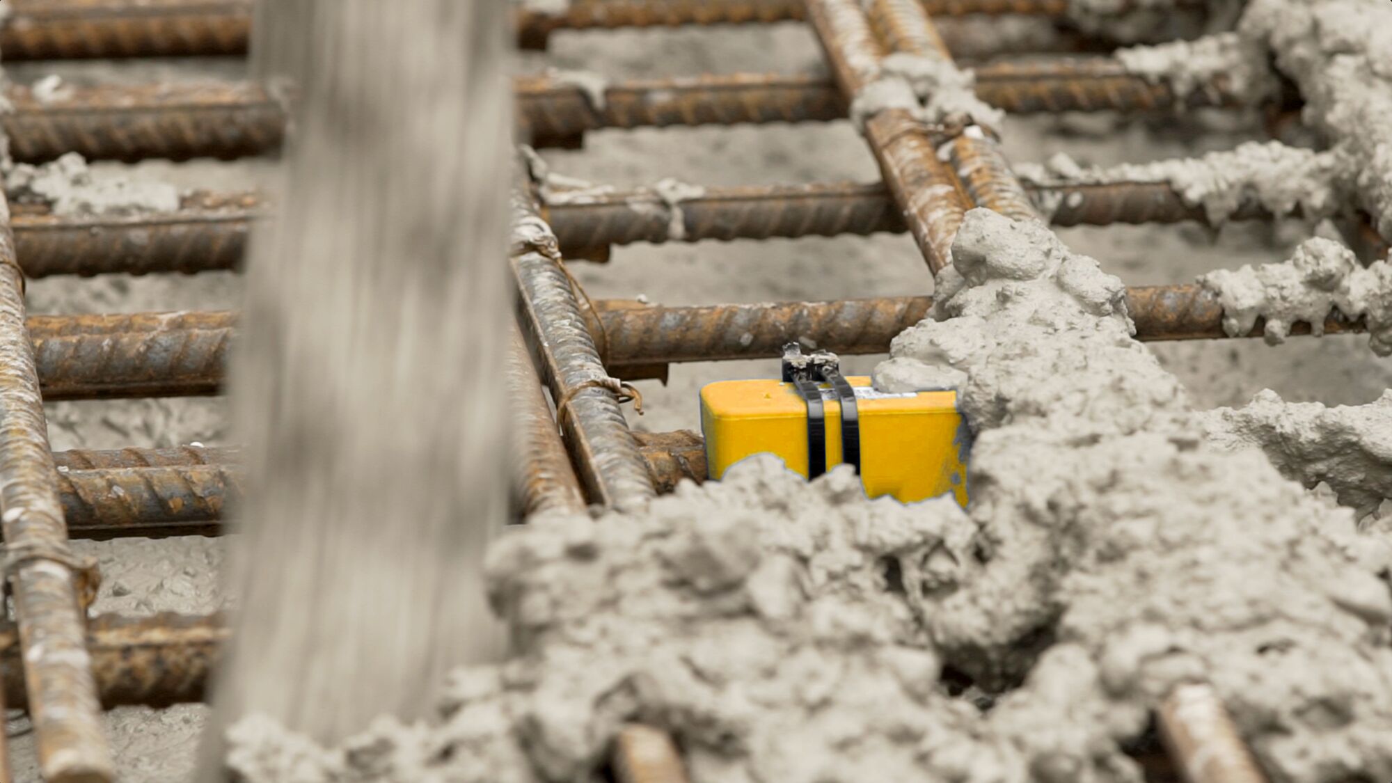 This is an image of a sensor with concrete being poured