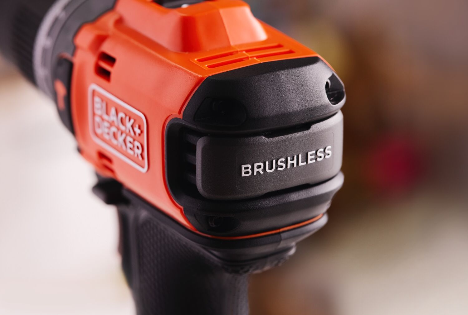 Close-up of the 'brushless' branding on the BLACK+DECKER® 18V POWERCONNECT™ Brushless Hammer Drill.