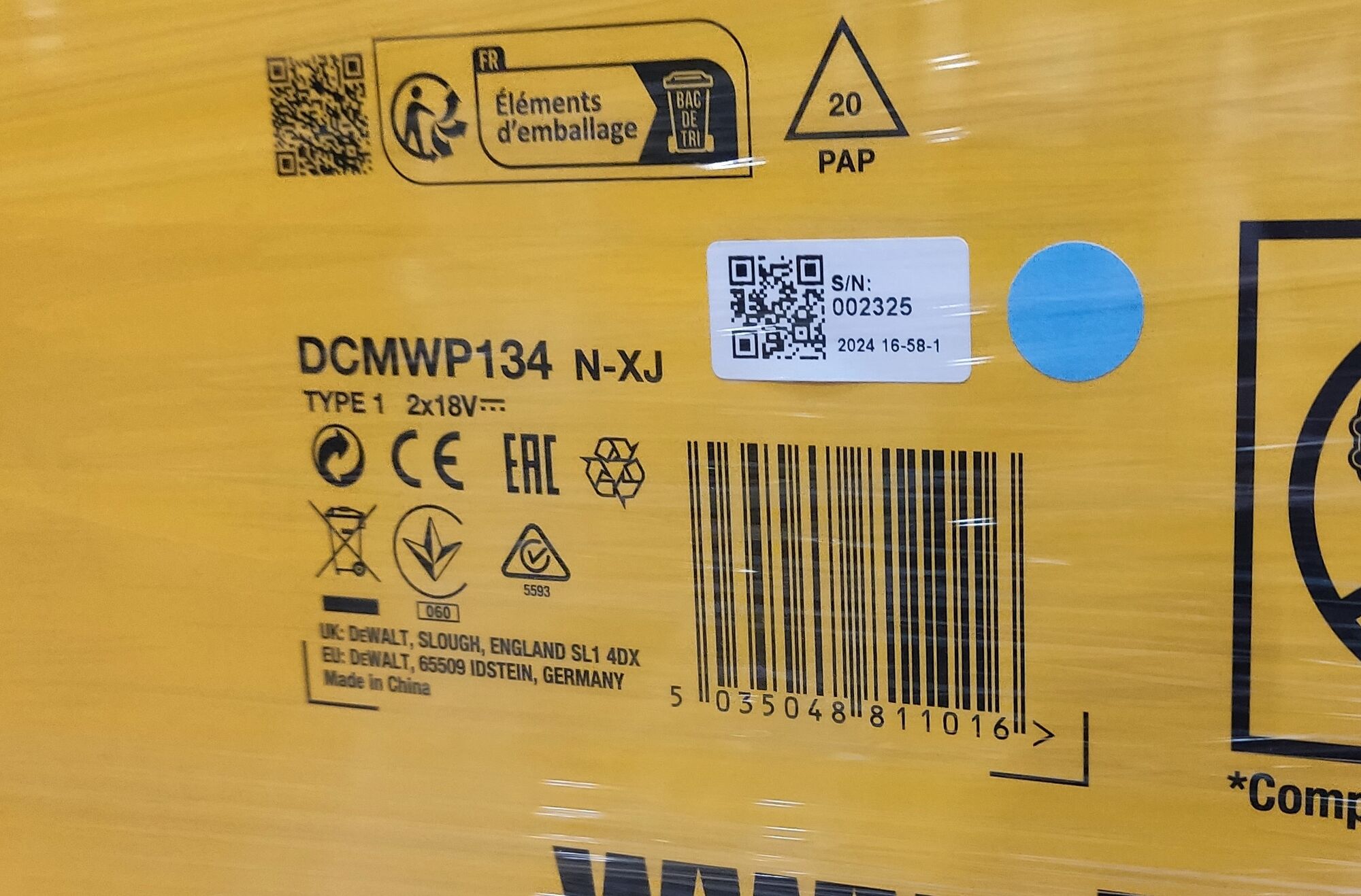 Label snapshot of DEWALT Walkbehind Mower Carton with Model Number and production date reference with a blue sticker.