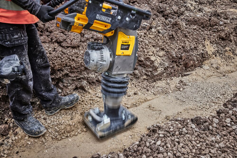 Powershift Rammer vibrating as it compacts ground on construction site